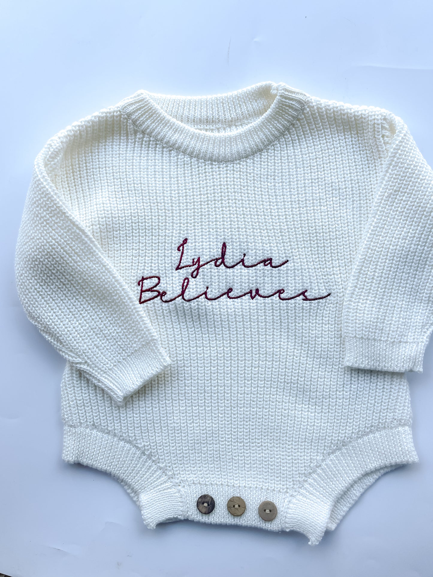 Personalised Baby Christmas Romper – “Name Believes” Embroidered Knitted Outfit