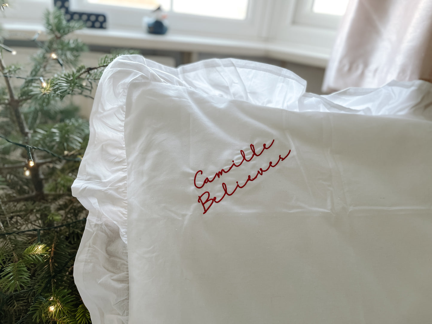 Embroidered personalised Christmas I believe pillow cases