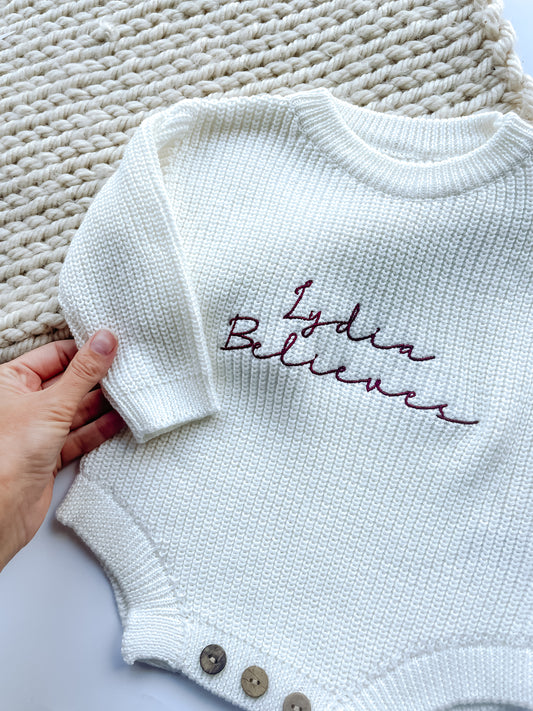 Personalised Baby Christmas Romper – “Name Believes” Embroidered Knitted Outfit