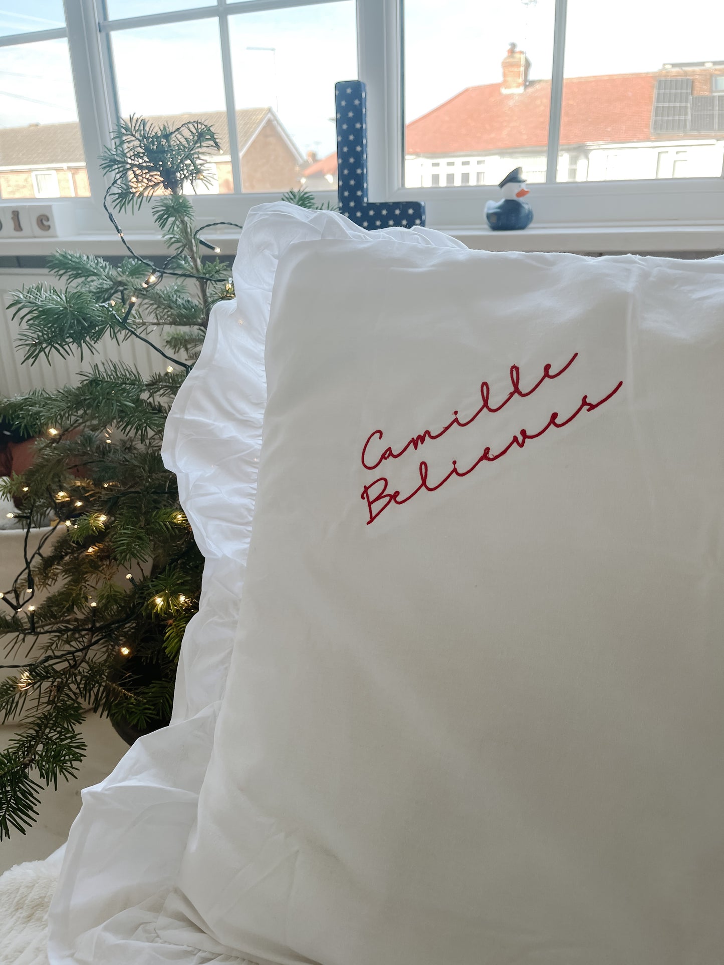 Embroidered personalised Christmas I believe pillow cases
