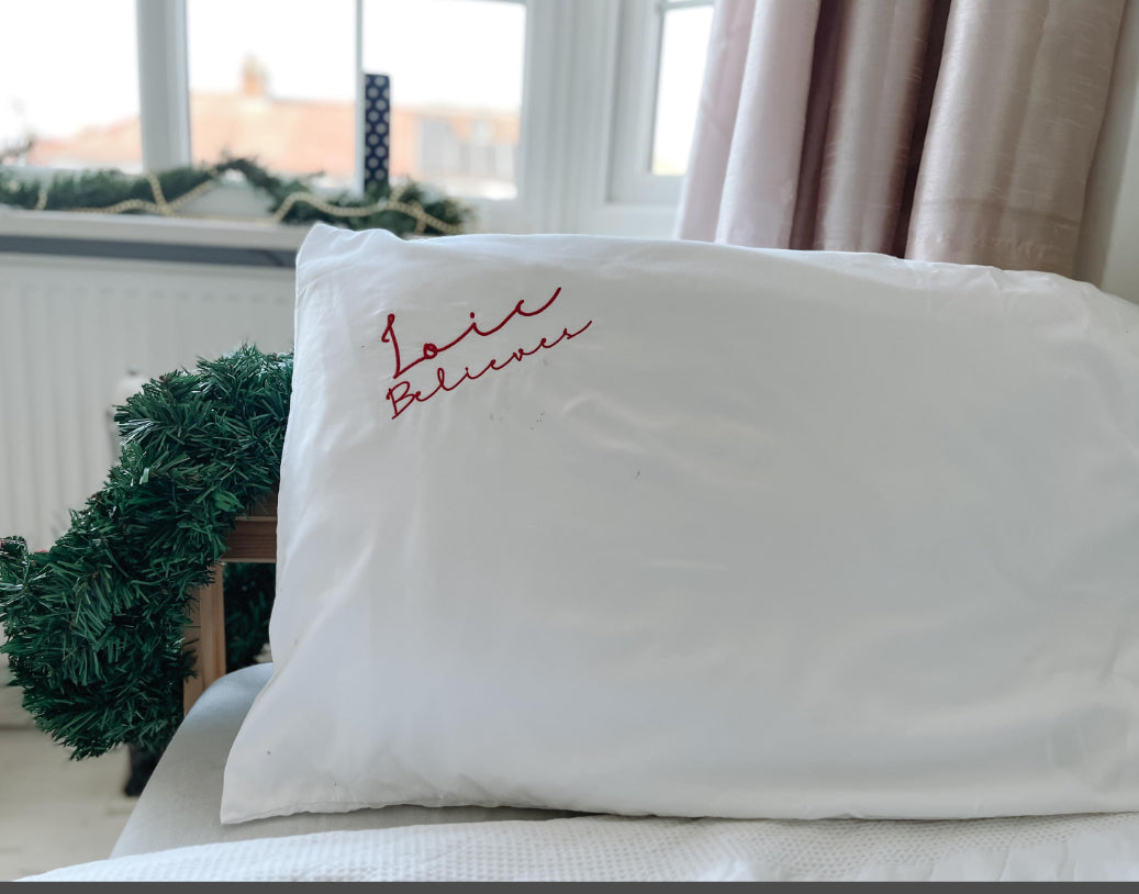 Embroidered personalised Christmas I believe pillow cases