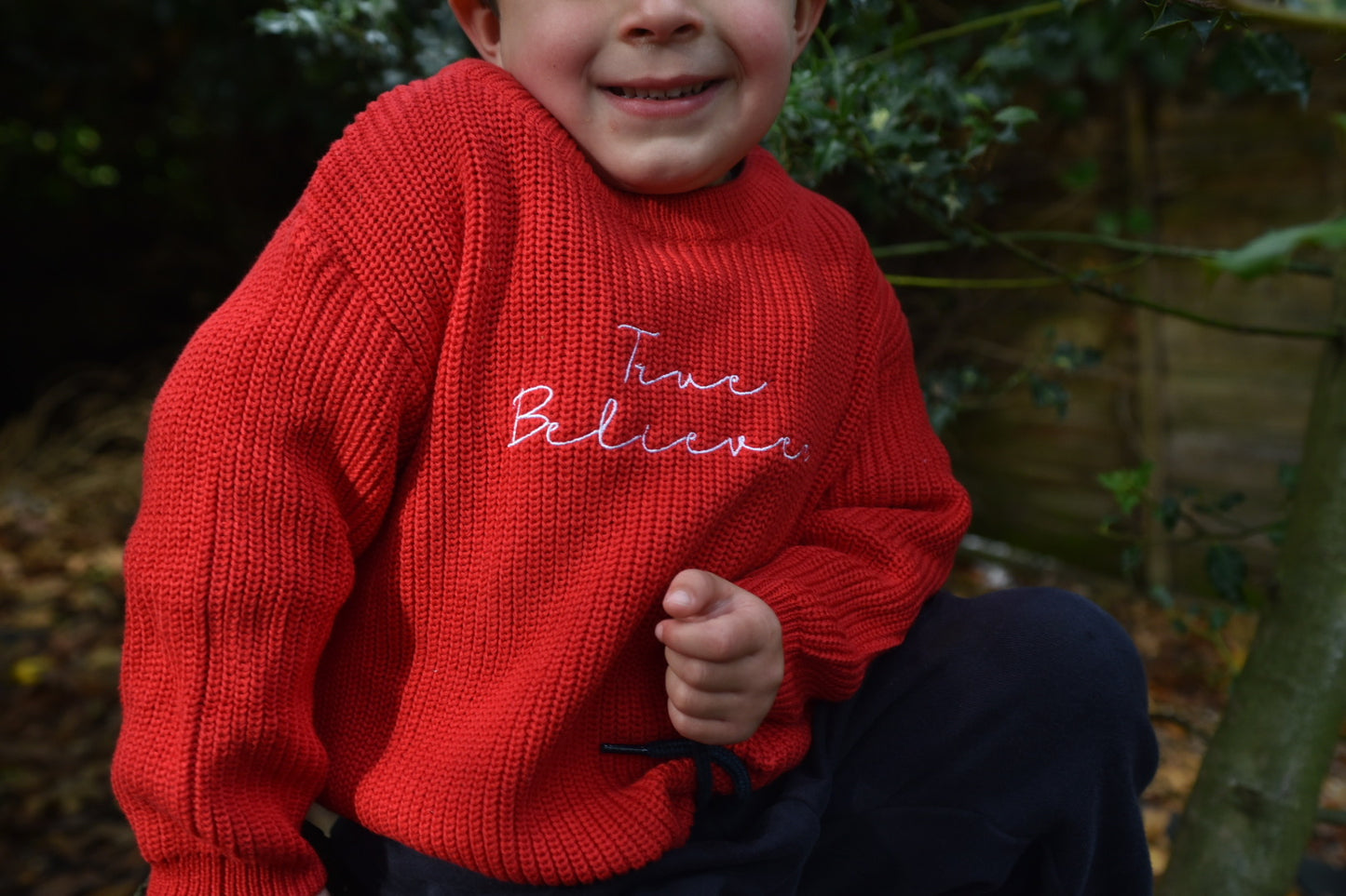 True believer children’s knitted Christmas sweatshirt