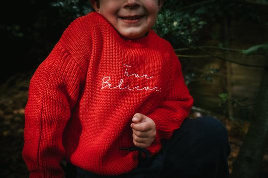 True believer children’s knitted Christmas sweatshirt