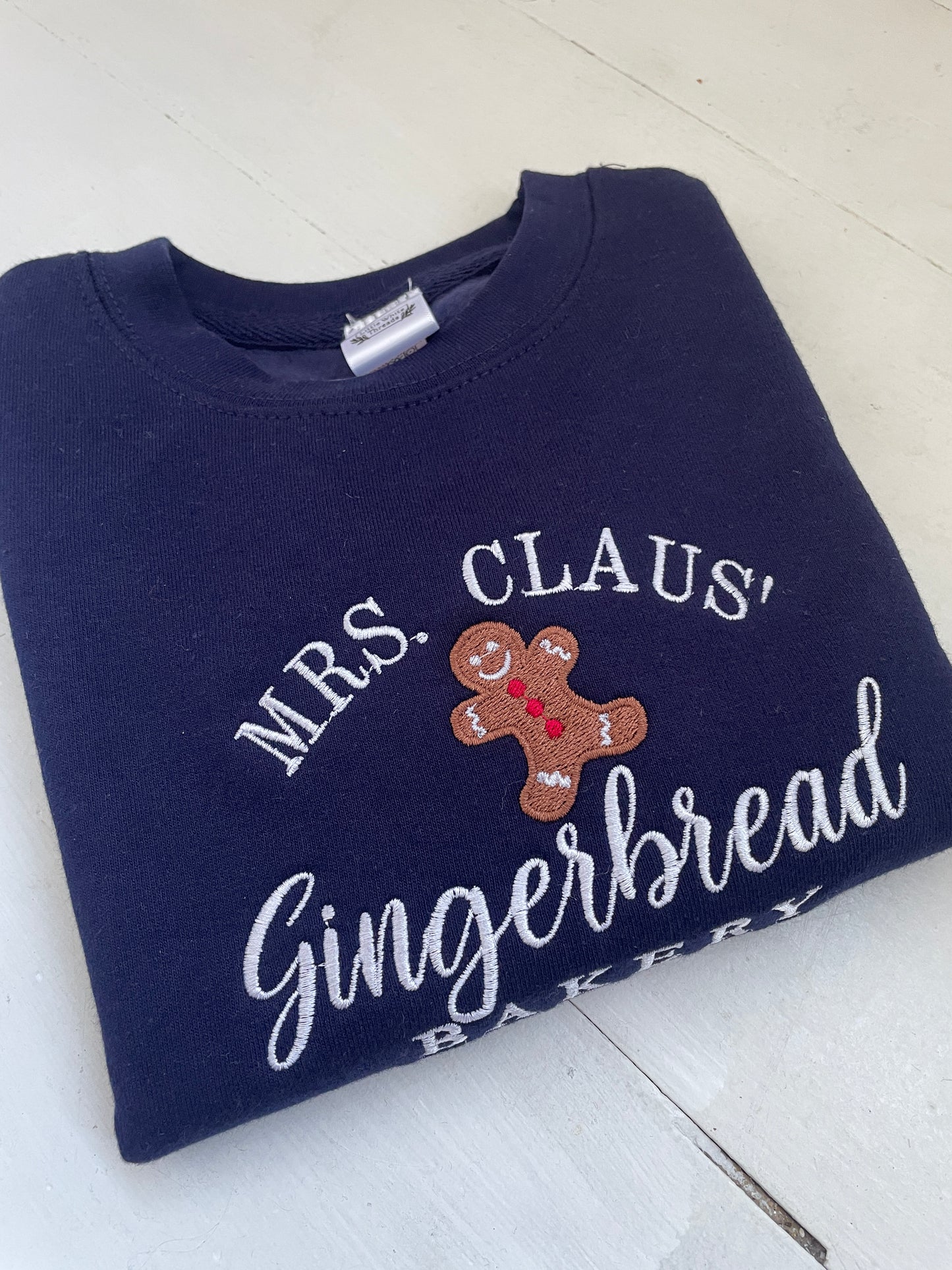 Embroidered Christmas Mrs Claus’ bakery children's sweatshirt