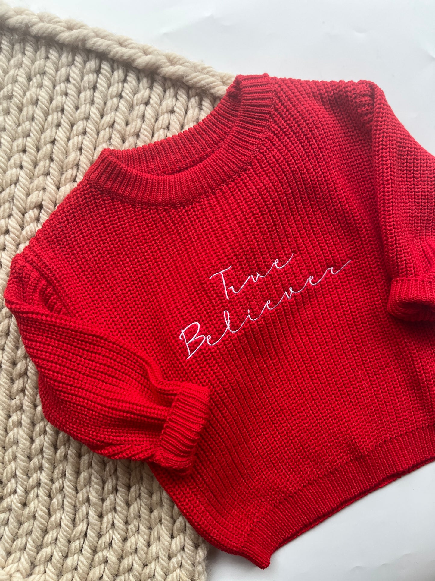 True believer children’s knitted Christmas sweatshirt