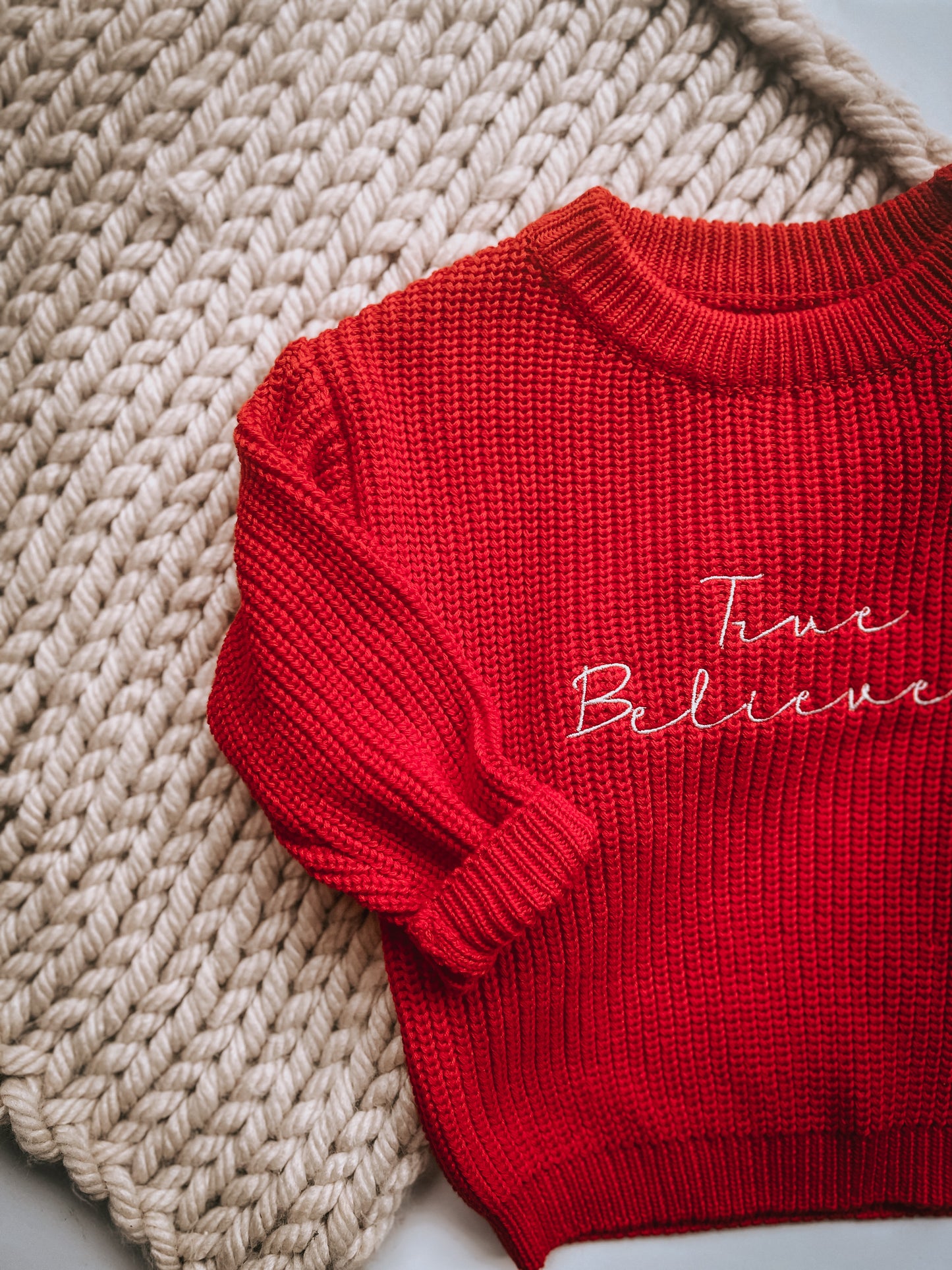 True believer children’s knitted Christmas sweatshirt
